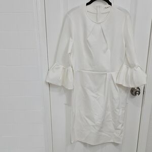 Elegant White Dress with Ruffled Sleeves